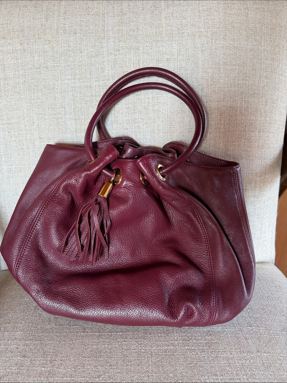Michael Kors Burgundy Pebbled Leather Tassel Hobo